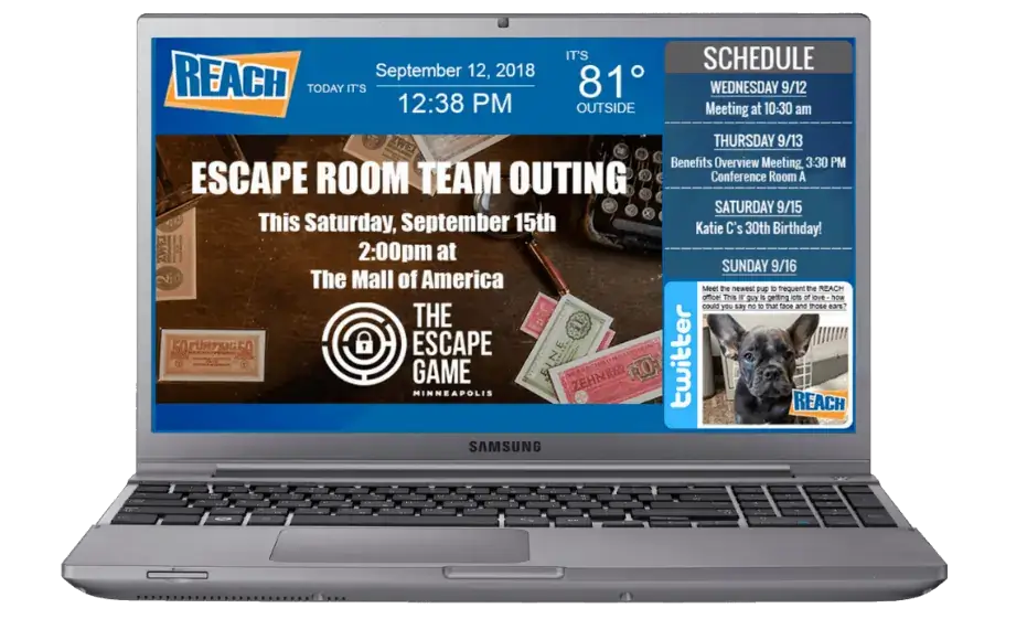 A laptop with REACH Media Network signage and local information displayed. 