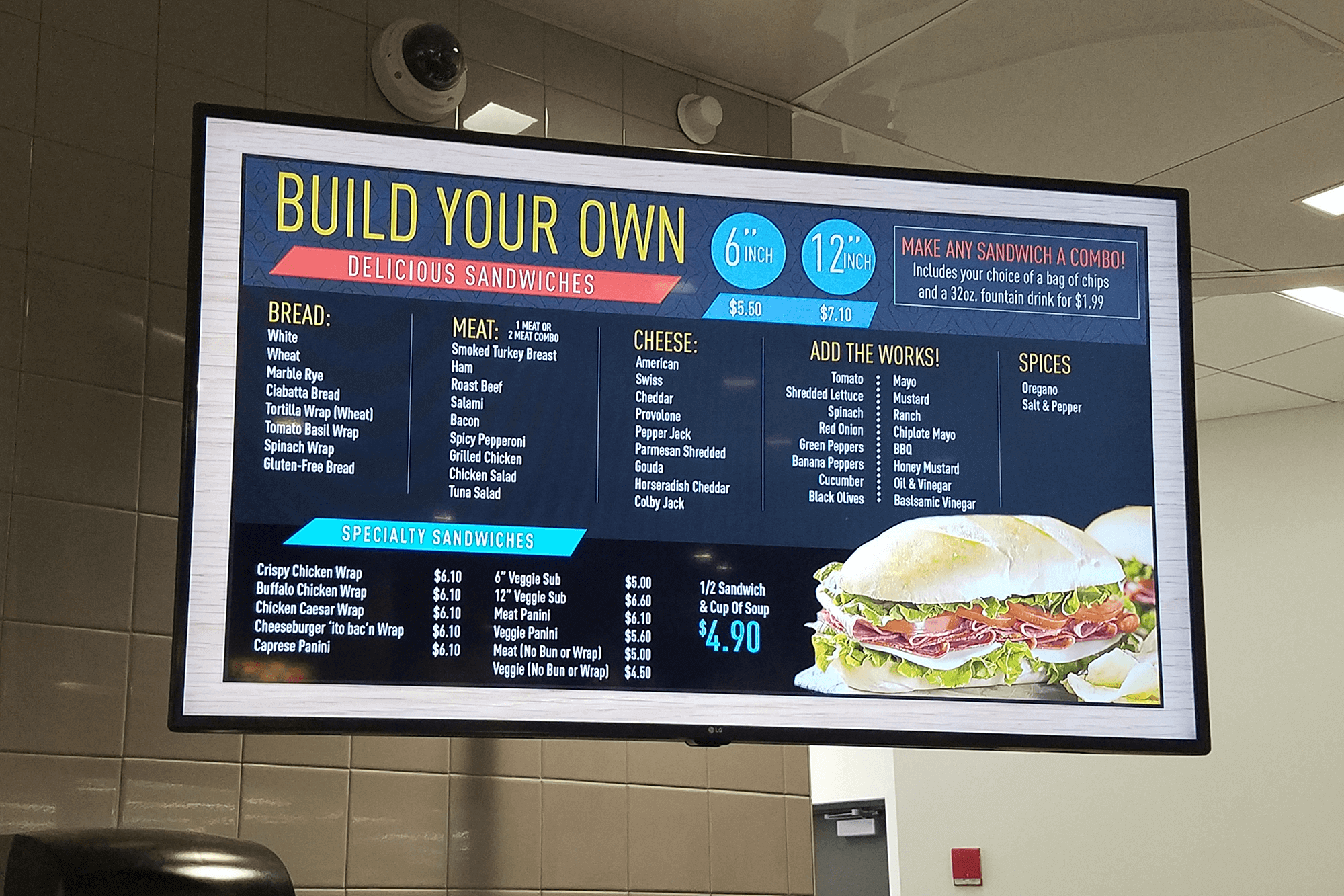Build Your Own sandwich menu board featuring sandwich ingredients and pricing