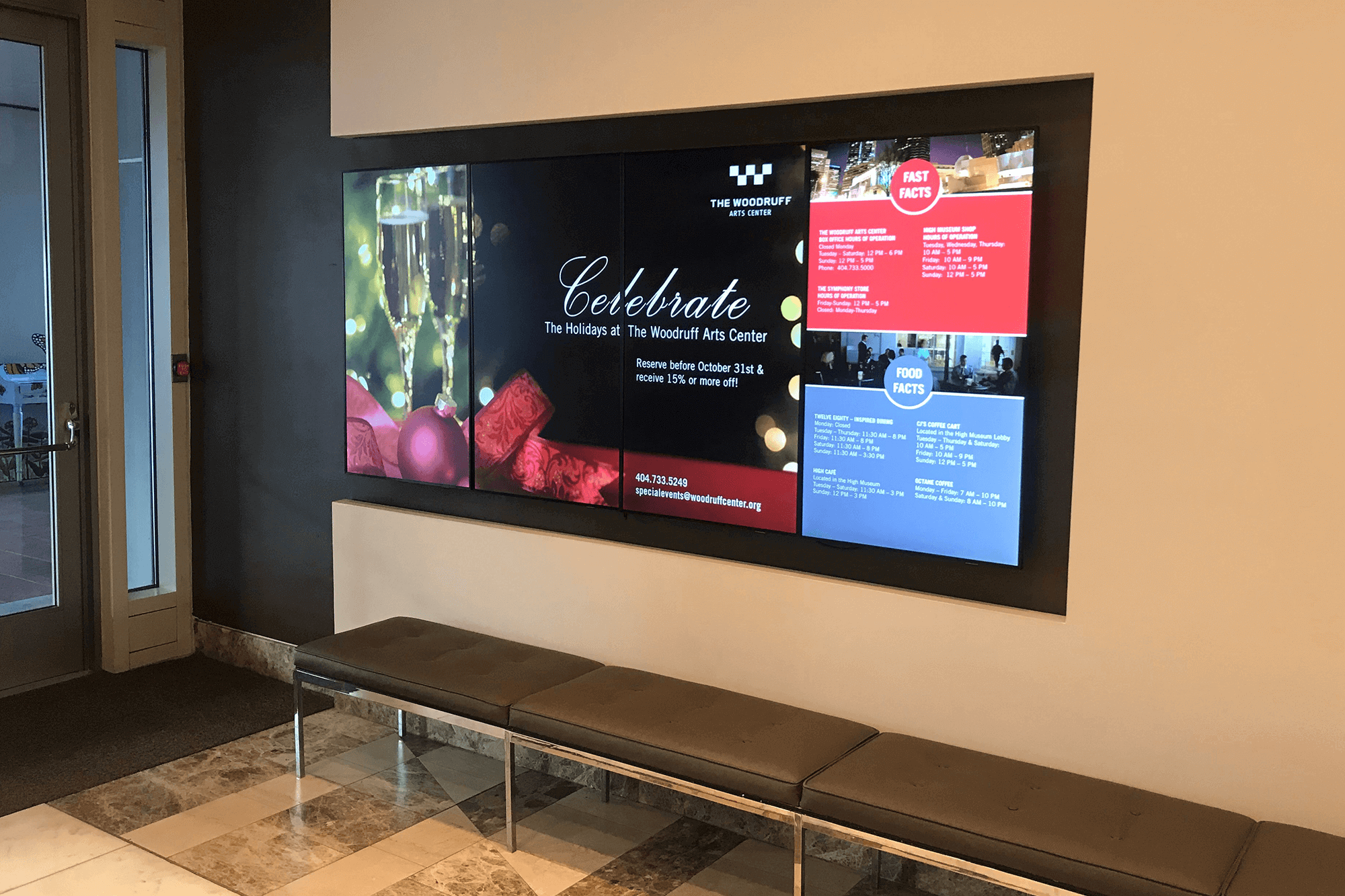 Multi-screen digital video wall featuring fun facts within the Woodruff Arts Center lobby