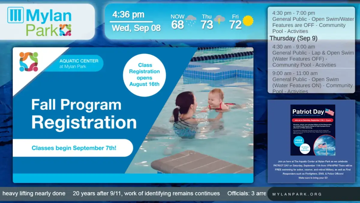 Mylan Park digital signage screen from Reach Media Network displaying fall program registration, upcoming schedule, and Patriot Day Facebook post.
