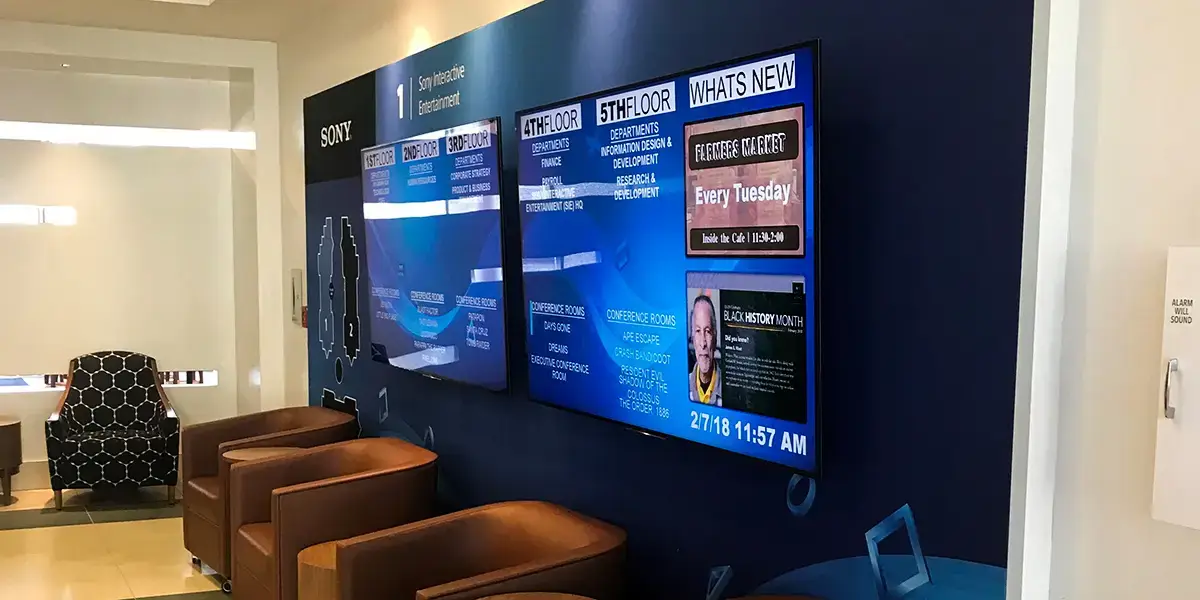 Customer example of a multi-screen blue breakroom digital signage