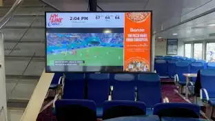 Hy-Line Cruises digital signage example from Reach Media Network displaying live soccer game and promotions
