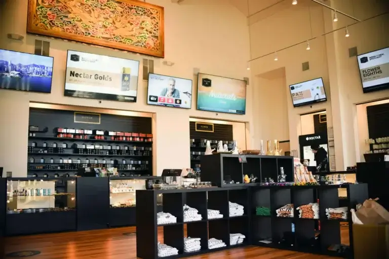 Nectar Markets cannabis digital signage from Reach Media Network featured on store walls, displaying product promotions