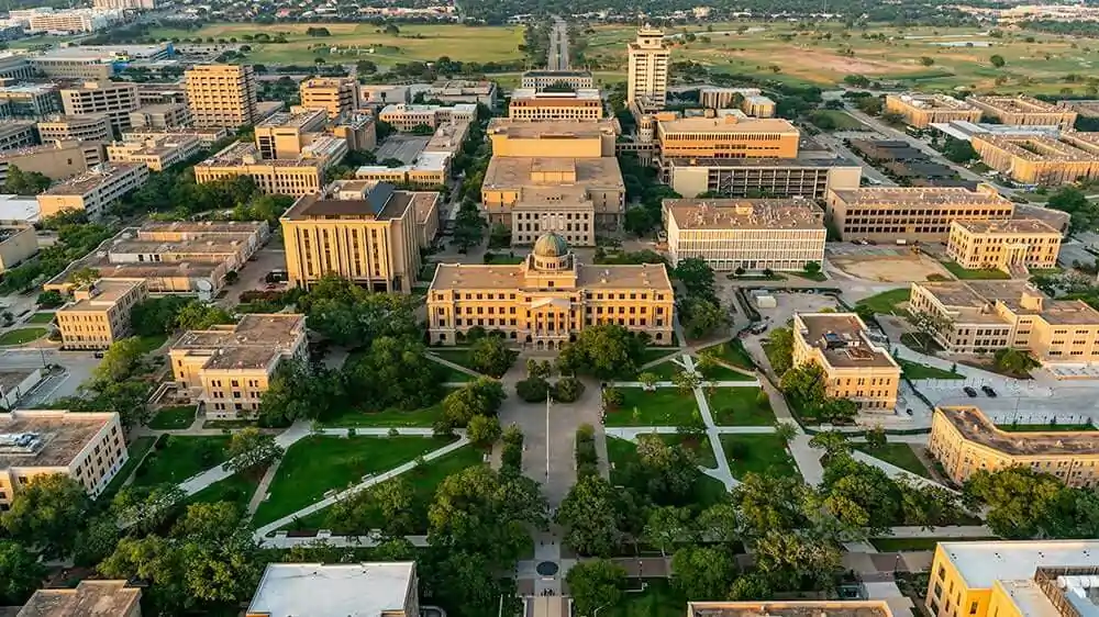 Texas A&M University campus aerial view, Reach Media Network digital signage takeover