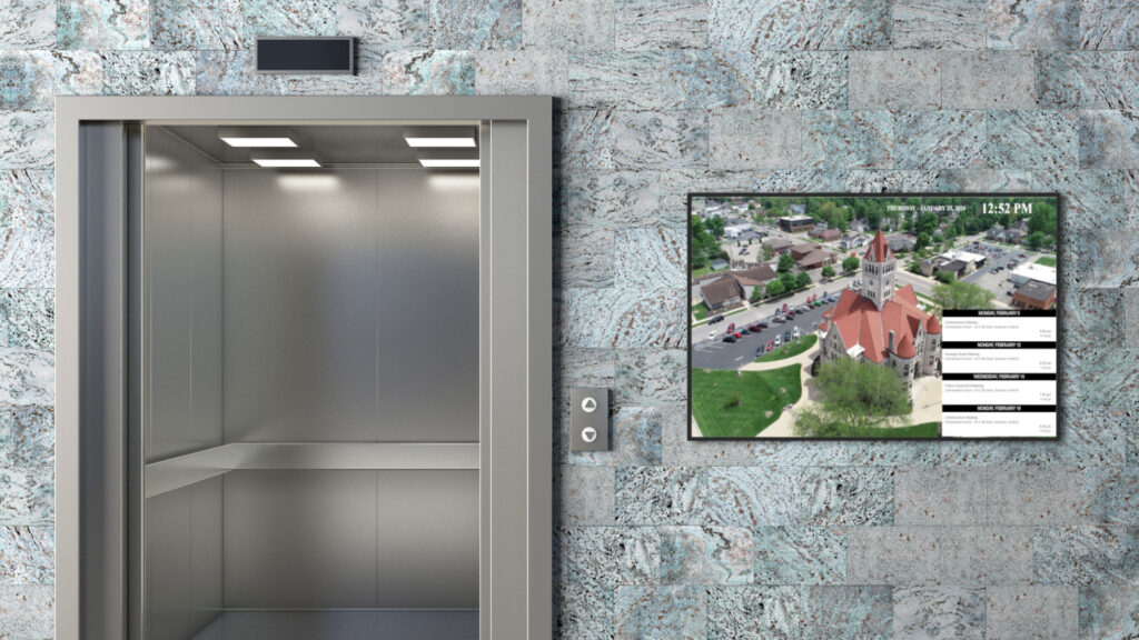 Government-min hospitality digital signage featured by elevator, reach media network, 2024