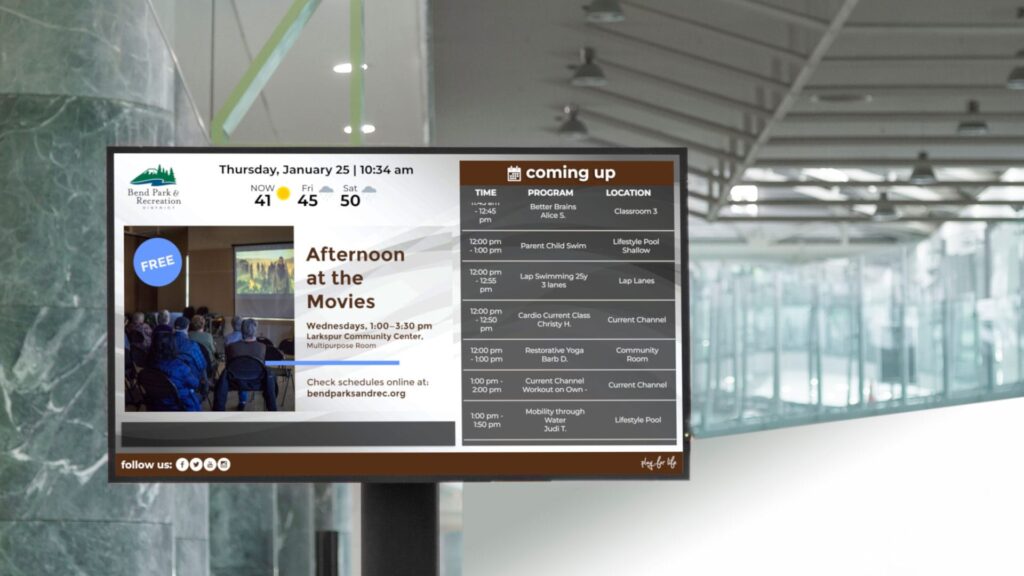 Parks--Rec-min Government digital signage screen displaying schedule and announcements.