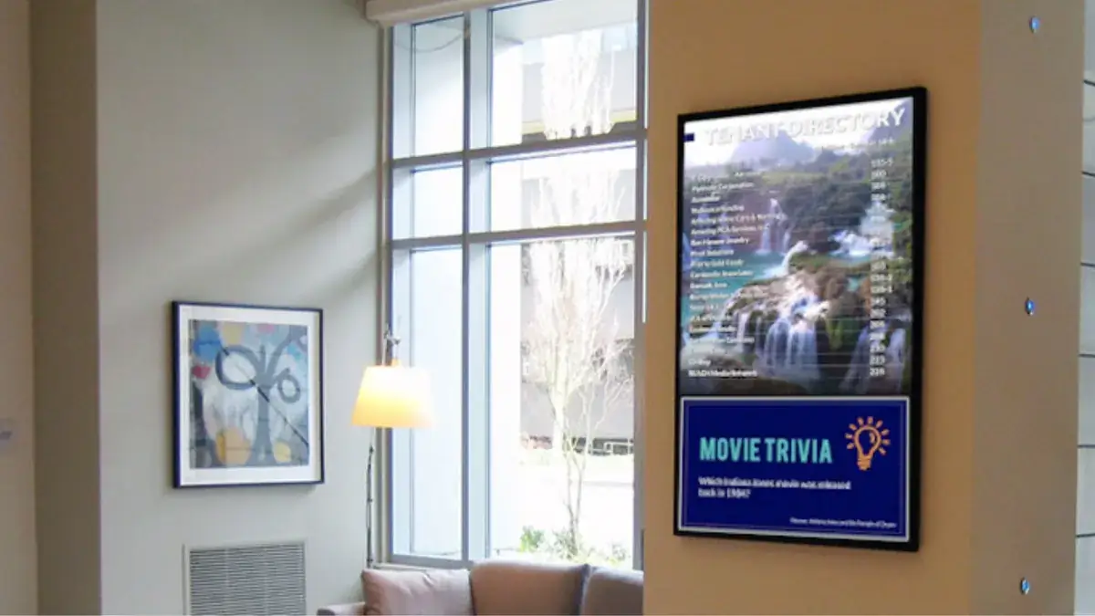 vertical digital signage directory from Reach Media Network placed in main lobby.