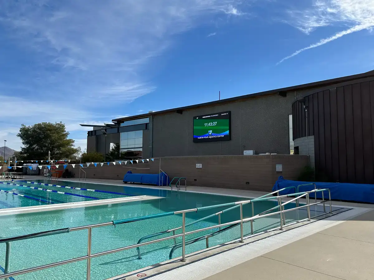 Valley of the Sun JCC outdoor digital signage display from Reach Media Network showing date and time