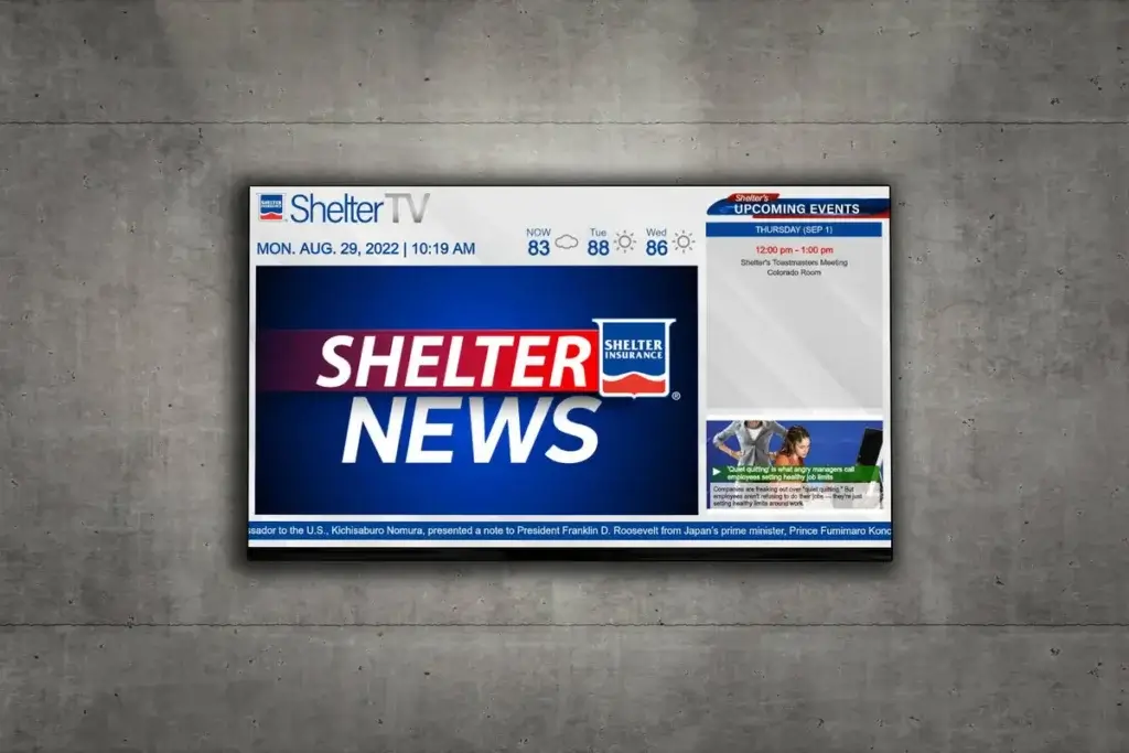 Corporate-Shelter-Insurance-Announcements-Schedule-Headlines-Ticker "Shelter News" live stream on a wall-mounted display, powered by REACH Media Network.