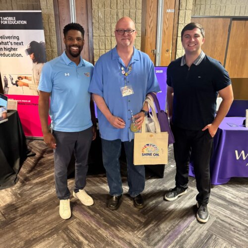 CJ Smith and Camden Leahy meeting with clients at the Northwestern Preferred Vendors Expo