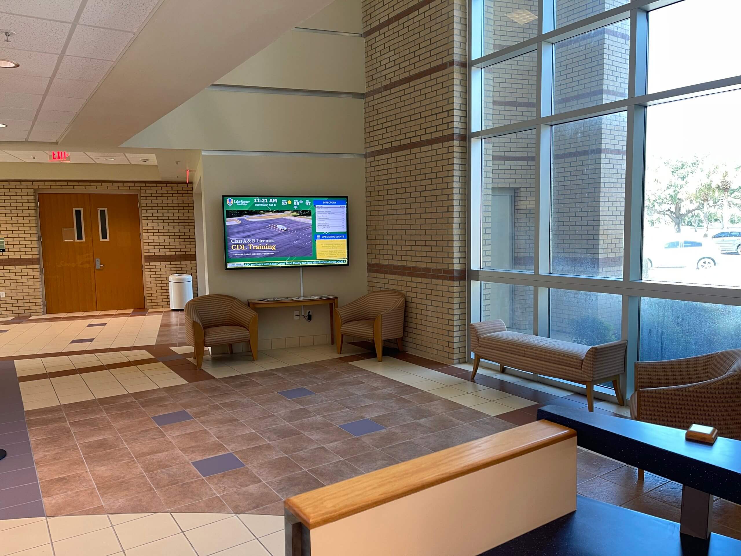Lake-Sumter State College hallway digital signage displaying digital directories, upcoming events, and announcements