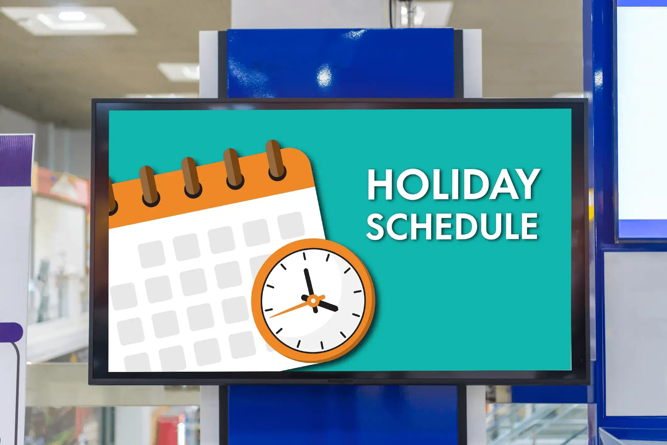 A digital display, reading "Holiday Schedule", powered by REACH Media Network.