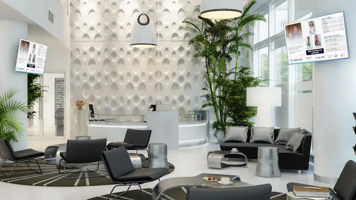Multiple digital signage screens featured in lobby, Reach Media Network