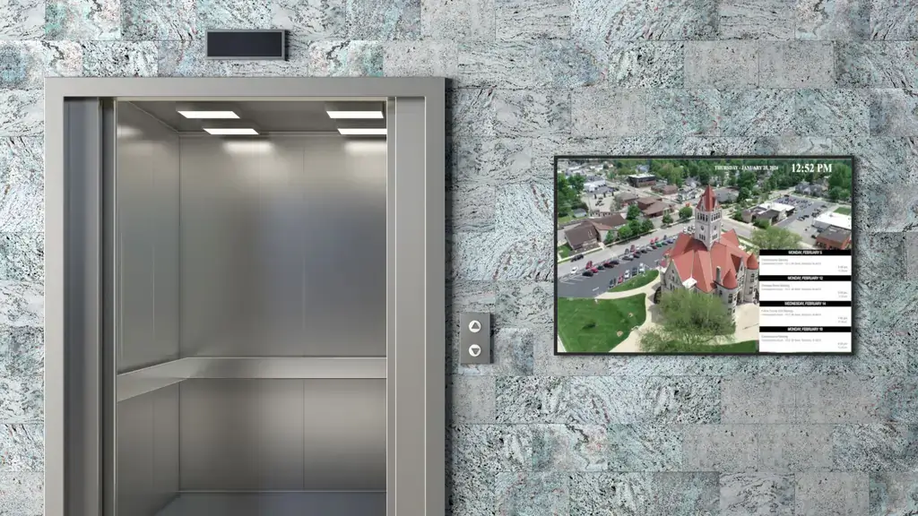 government digital signage featured by elevator, Reach Media Network, 2025
