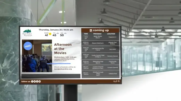 Parks and rec digital signage screen displaying schedule and announcements, Reach Media Network