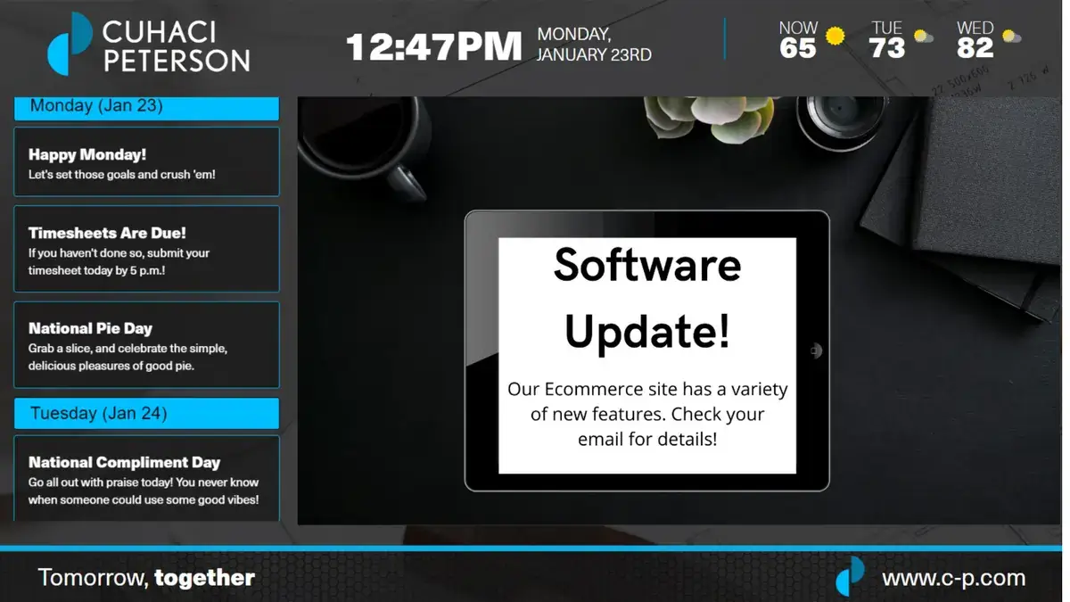 Corporate digital signage from Reach Media Network displaying daily calendar messages and announcements.