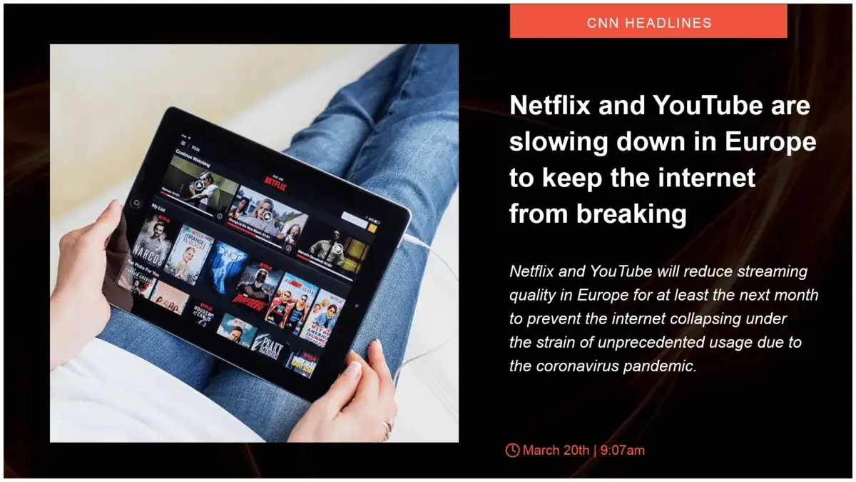 Digital signage screen displaying CNN headlines and imagery, black and red colors