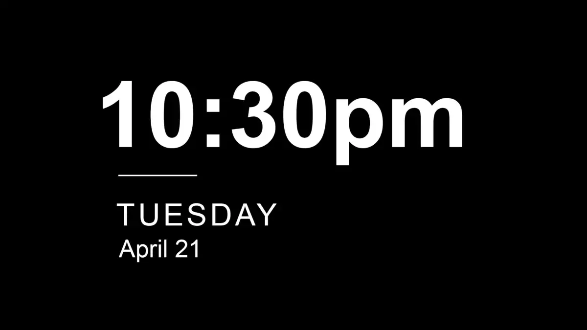 Digital signage screen from Reach Media Network displaying date and time