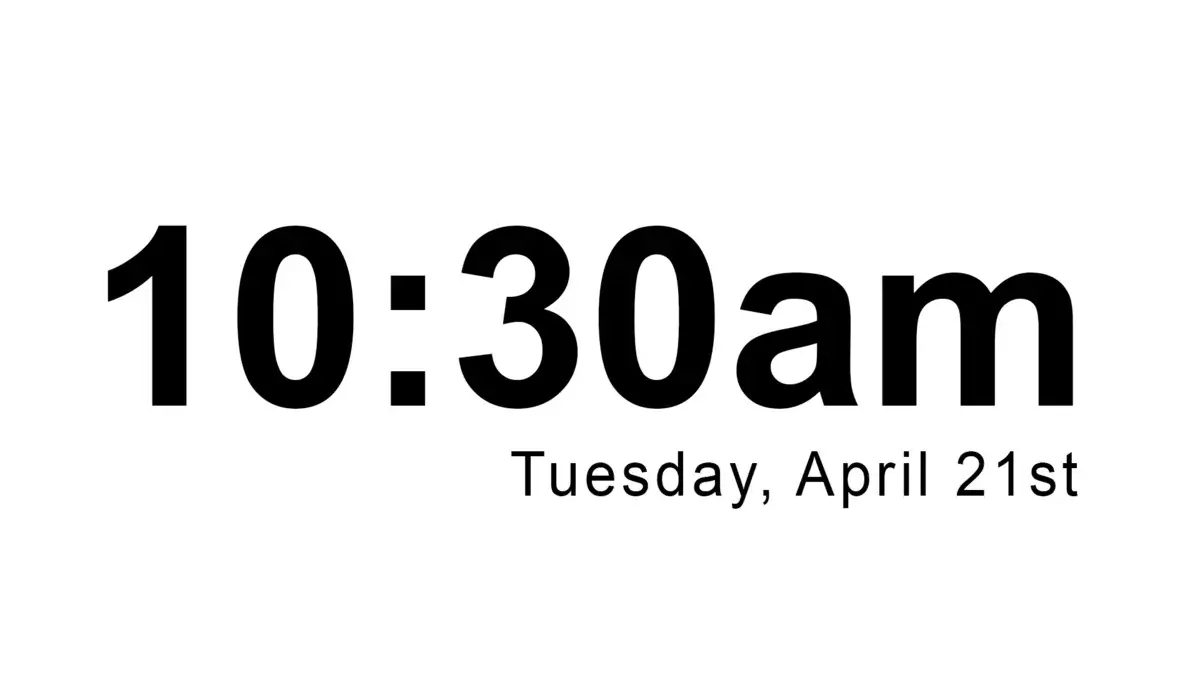 Digital signage screen from Reach Media Network displaying date and time