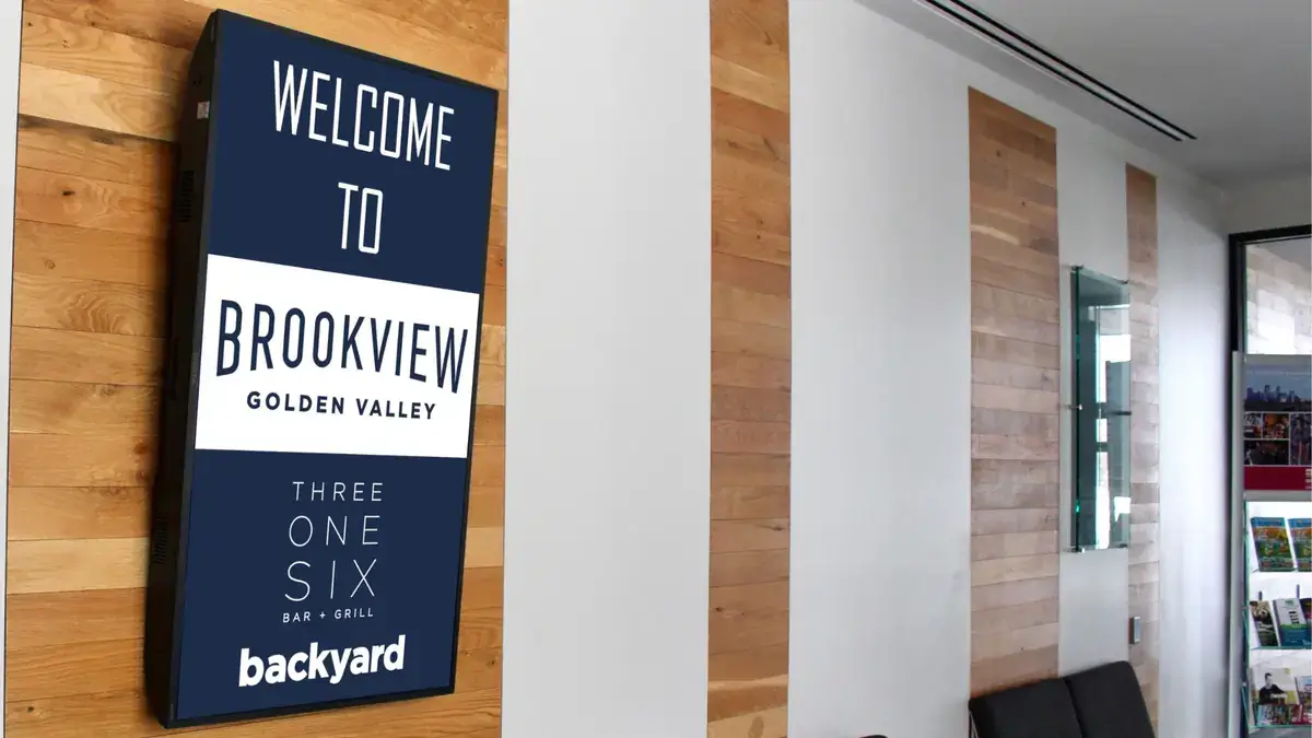 Brookview Golden Valley lobby horizontal digital signage from Reach Media Network displaying a welcome message.
