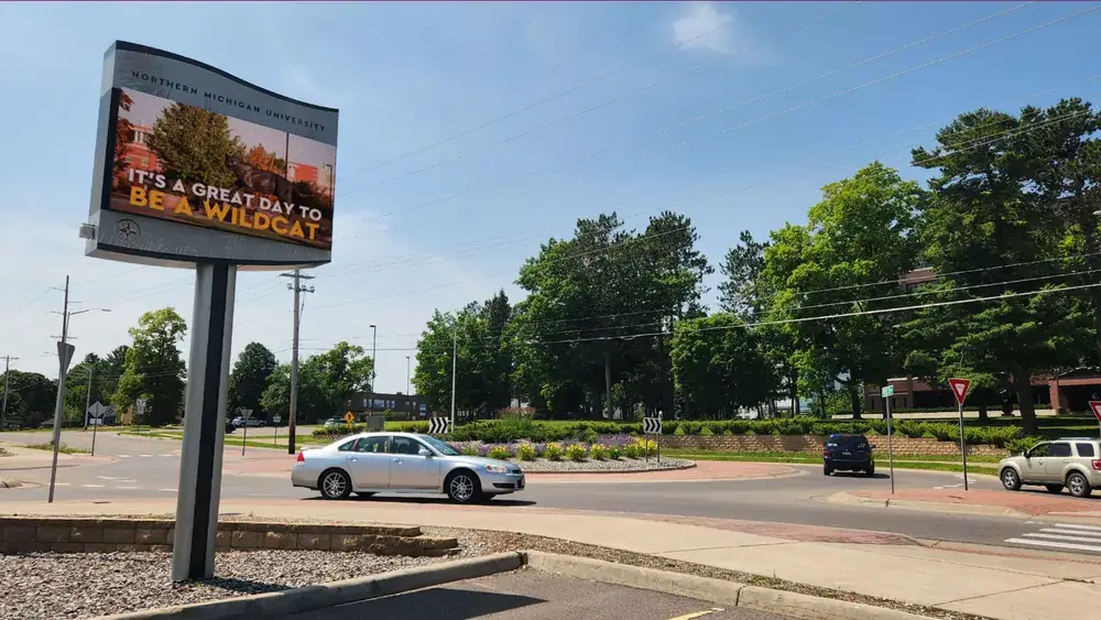 Northern Michigan University outdoor digital signage from Reach Media Network featured at property entrance