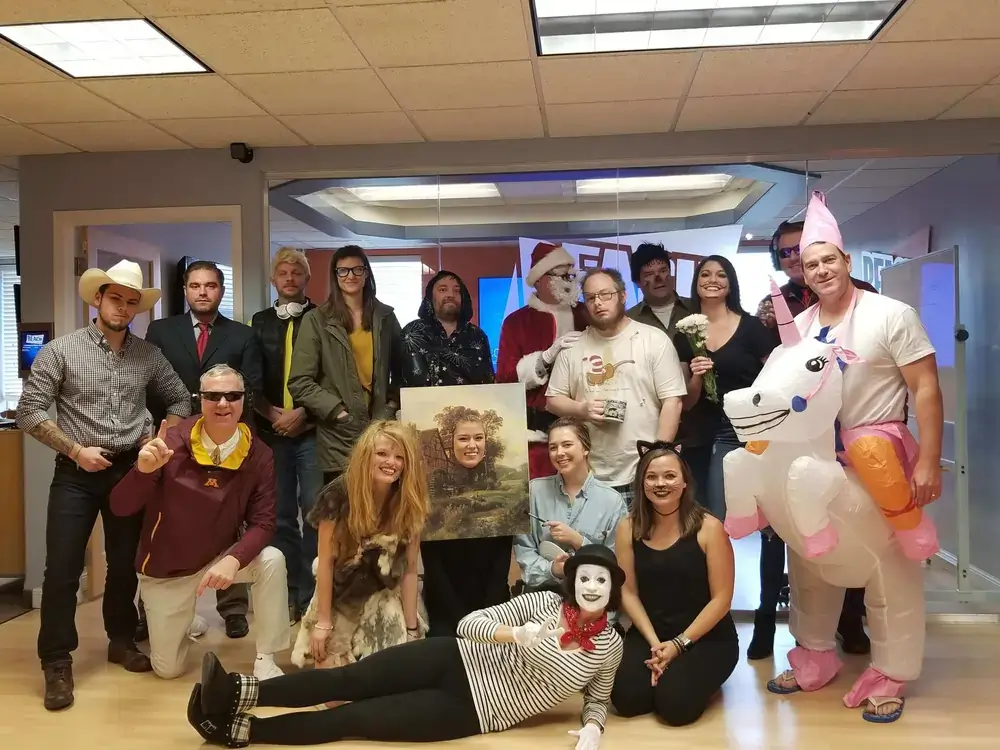 REACH Media Network team costume photo for Halloween party