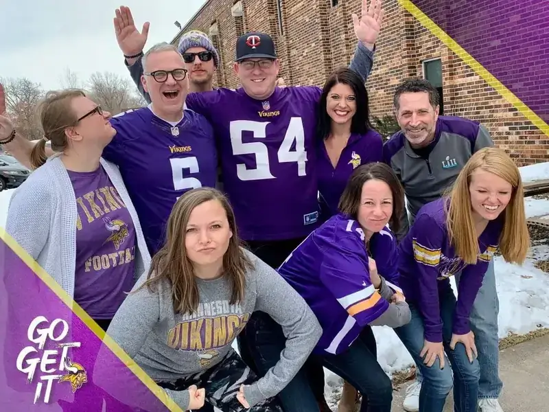 Reach Media Network digital signage team cheering on Minnesota Vikings