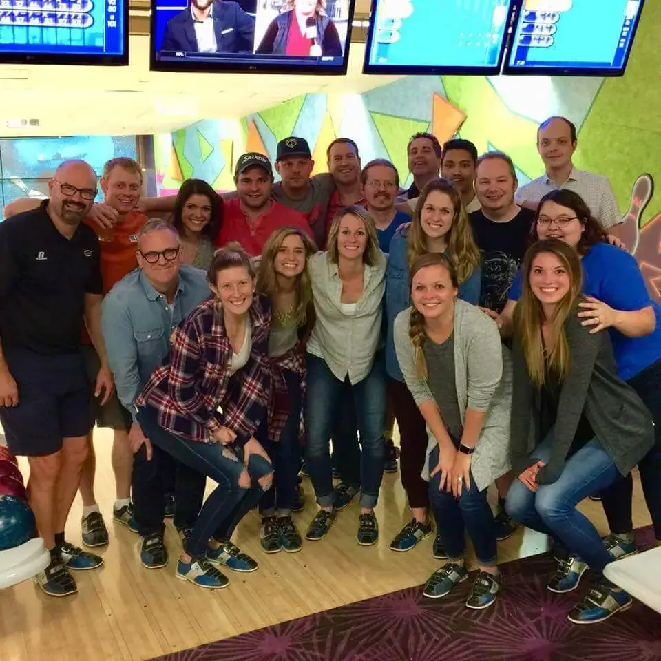 REACH Media Network team photo at bowling event