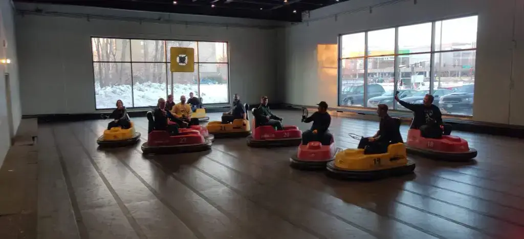 Reach Media Network digital signage teambuilding whirlyball bumper cars