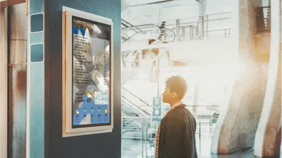 Reach-Media-Network-directories-digital-signage-solutions A wall-mounted wayfinding display at a transportation hub.