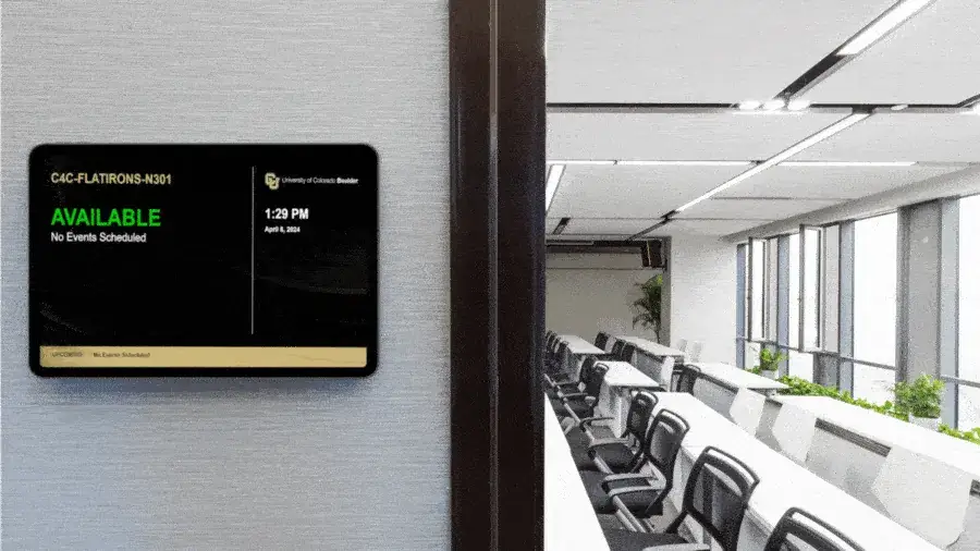 Reach-Media-Network-room-schedule-displays-digital-signage-solutions A small display outside of a corporate meeting room, displaying booking information.